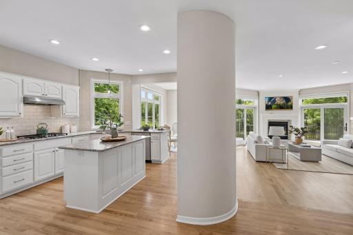 Convenient layout with kitchen adjacent to the family room, sitting room and formal dining.