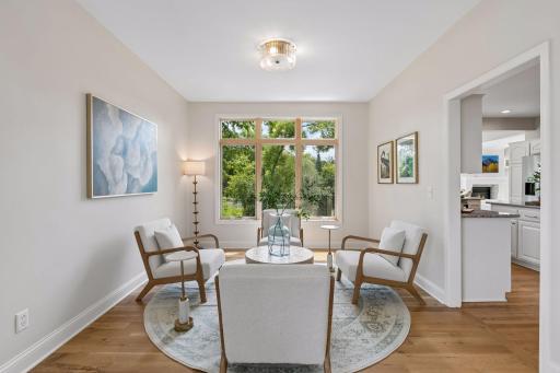 Living/sitting room overlooking the backyard and pond.