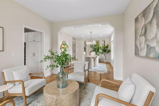 Cozy corner room offers flexible living space, ideal as a sitting room, home office, music room, hobby space, or study.