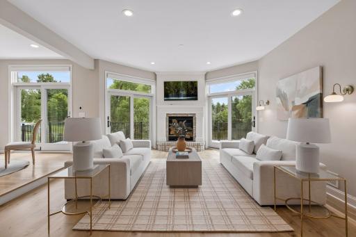 Three sets of Andersen brand sliding patio doors in the main level family room and informal dining (2023), all with mechanical window coverings (2025).