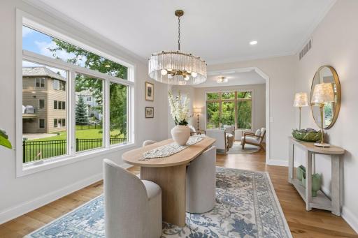 Spacious dining room and adjacent sitting room.
