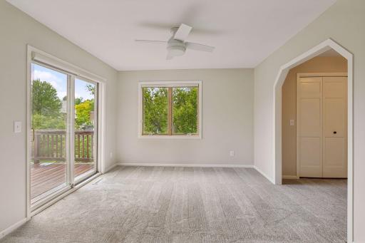 Fourth of four bedrooms upstairs, with access to the second story deck, with brand new carpet and paint.