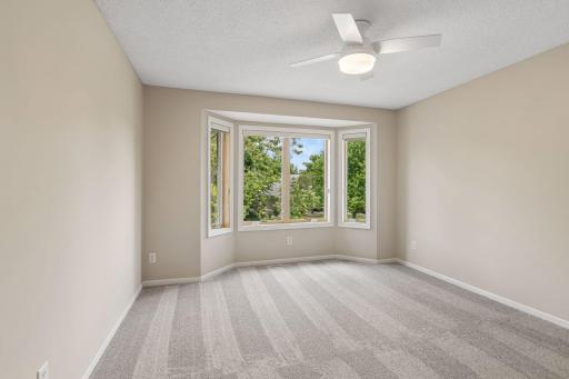 Third bedroom upstairs, freshly painted with brand new carpet.