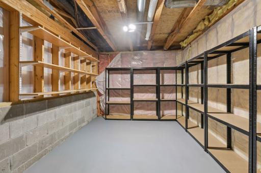 Large storage area, with storage shelves included.