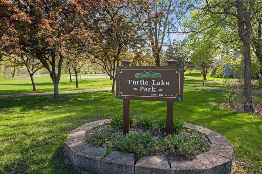Turtle Lake Park, with swimming beach and boat launch, trails, playground, restrooms, and rentable picnic shelter.
