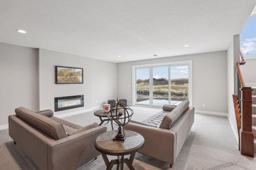 Huge Lower Family Room with 3 Panel Andersen Patio Doors