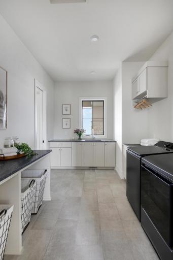 Main floor laundry room with plenty of work space