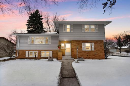 Welcoming entry with a mid-century exterior and Rogers Lake views on the horizon.
