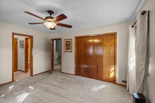 Quiet upstairs bedrooms with abundant natural light and classic charm.