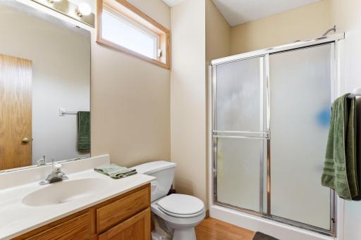 Main level 3/4 bathroom with walk-in shower