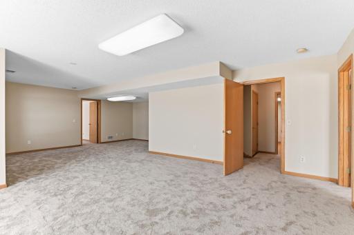 Lower level boasting two additional bedrooms and large storage room. Great potential for multi-generational living.