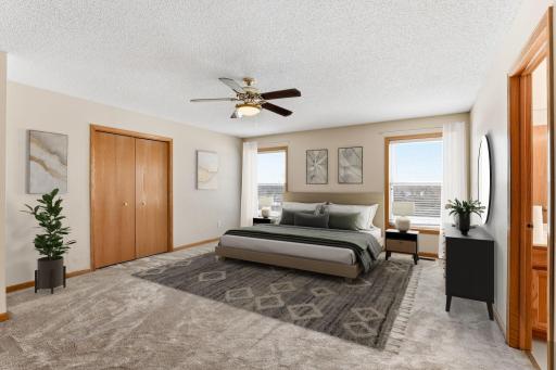 Vitually staged primary bedroom, so much room!