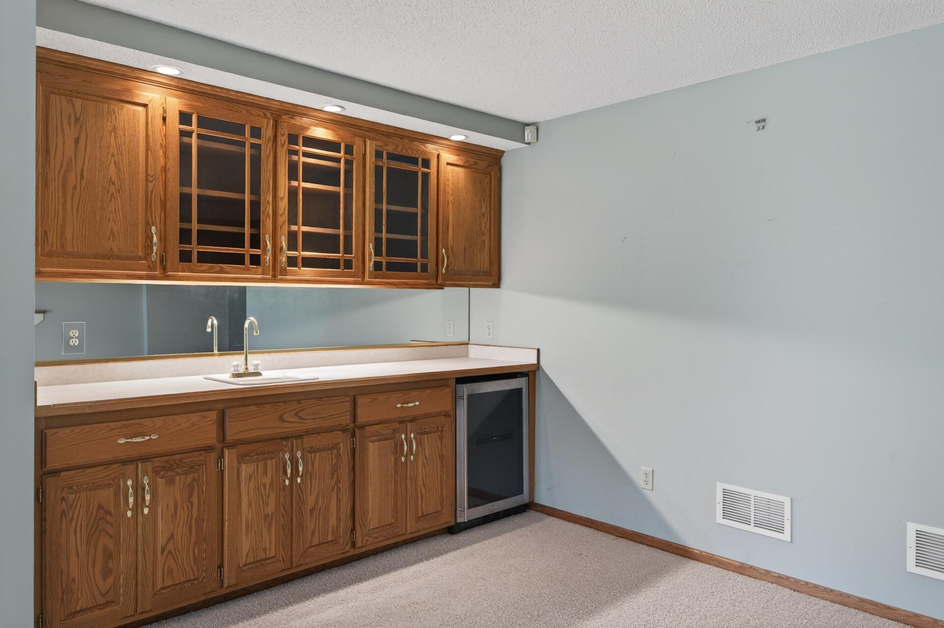 Wet bar with beverage refrigerator