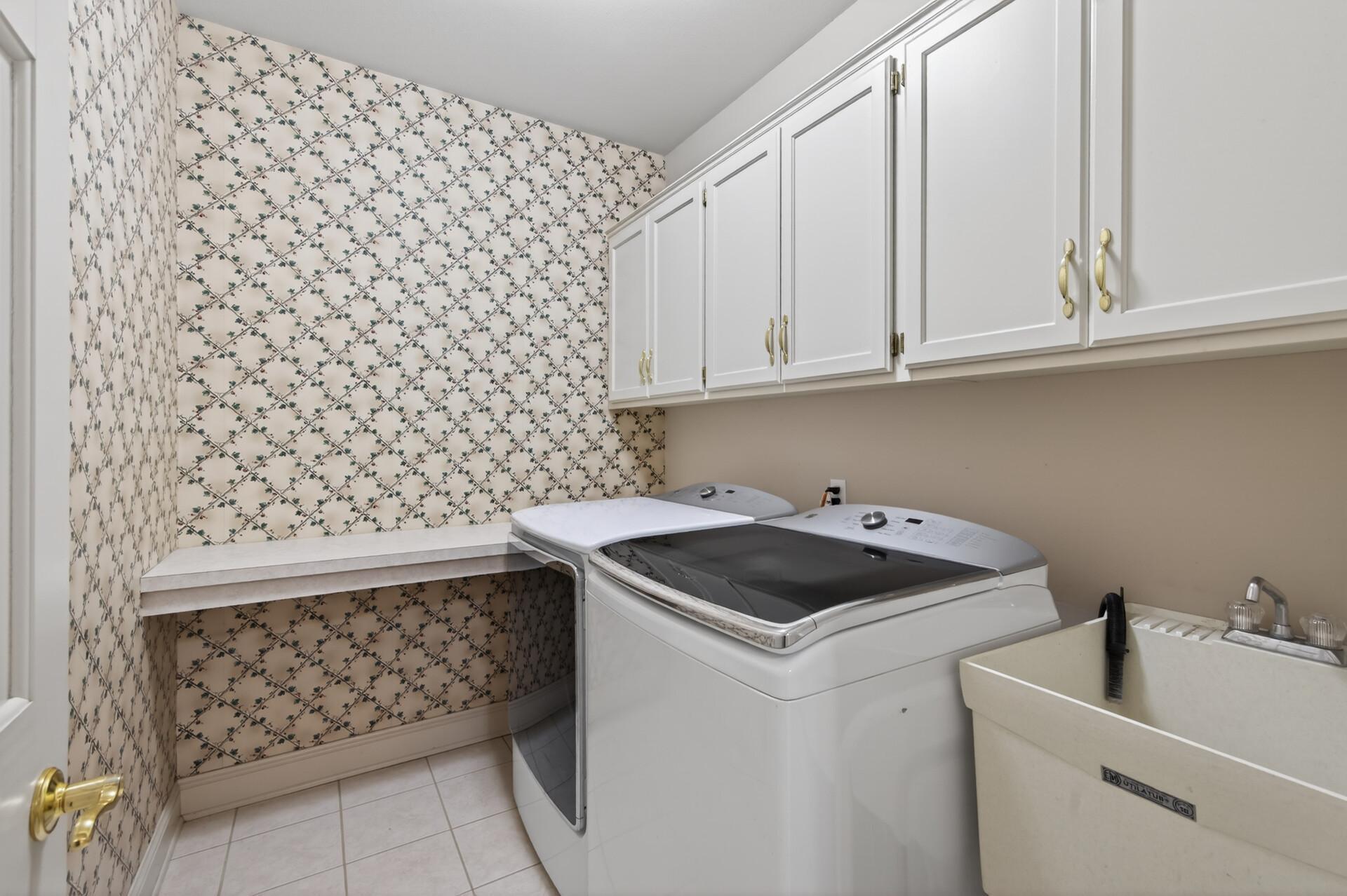 Main floor laundry with sink