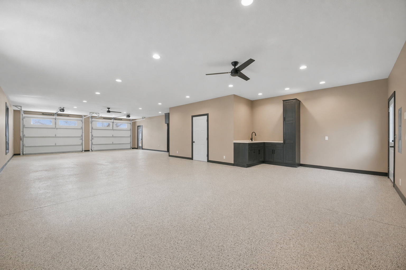 Finished 2+ Car Garage with extra flex space