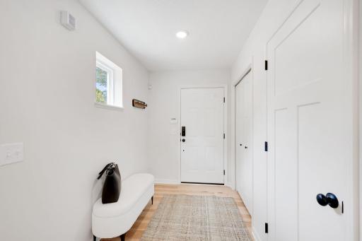 Front entry to the home with spacious closet.