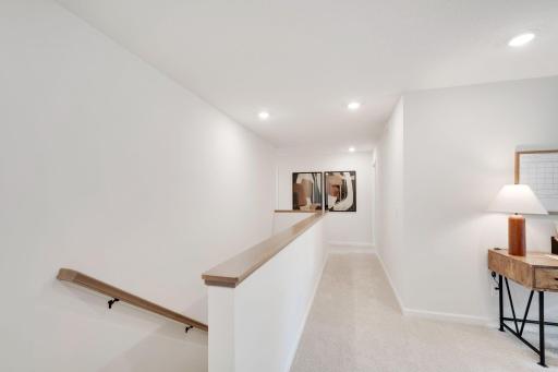 Hallway off the loft leading to all 4 bedrooms