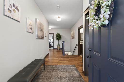 Wide hallway upon entering the home.