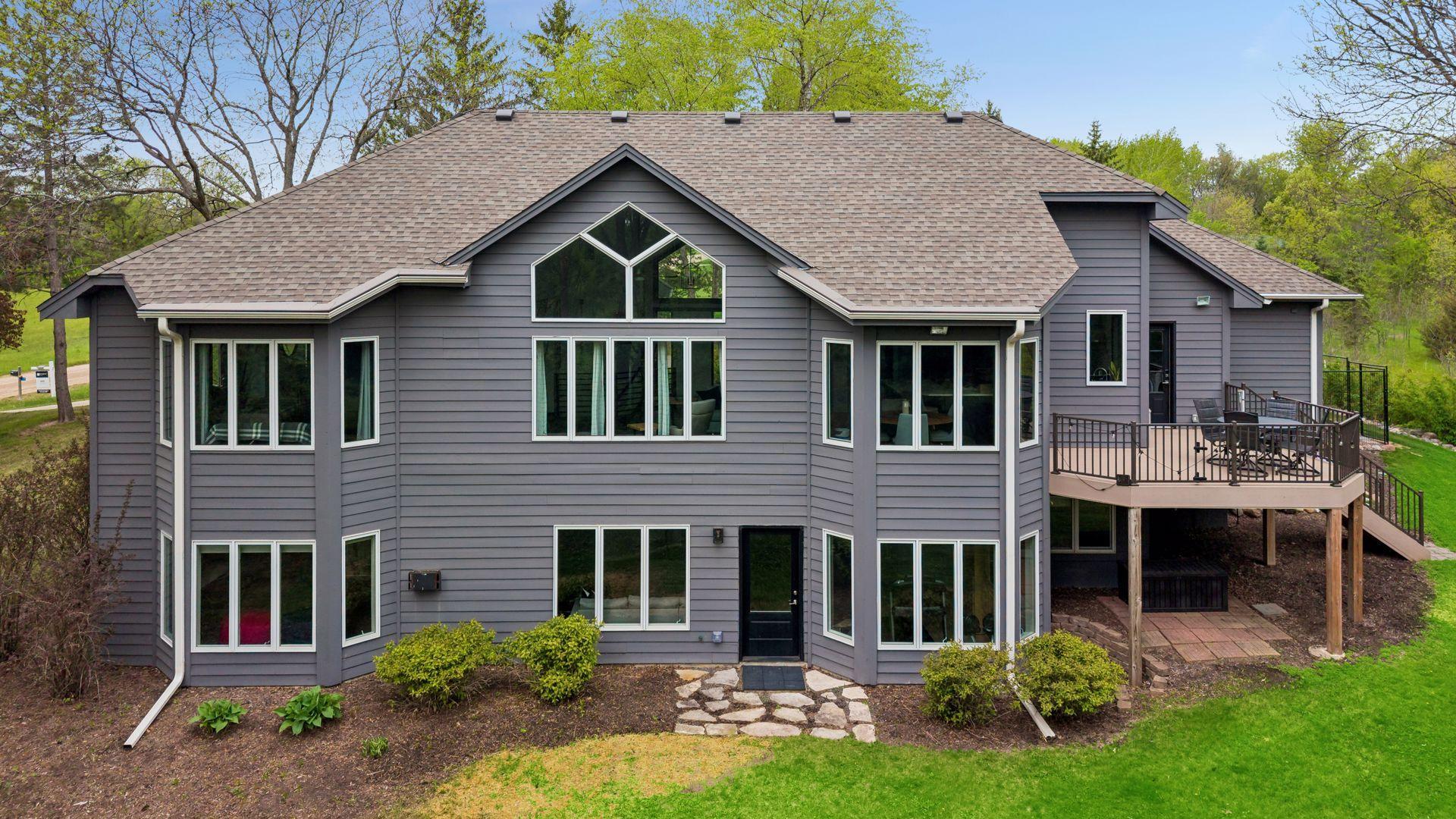 Rear exterior highlighting the home’s walkout design