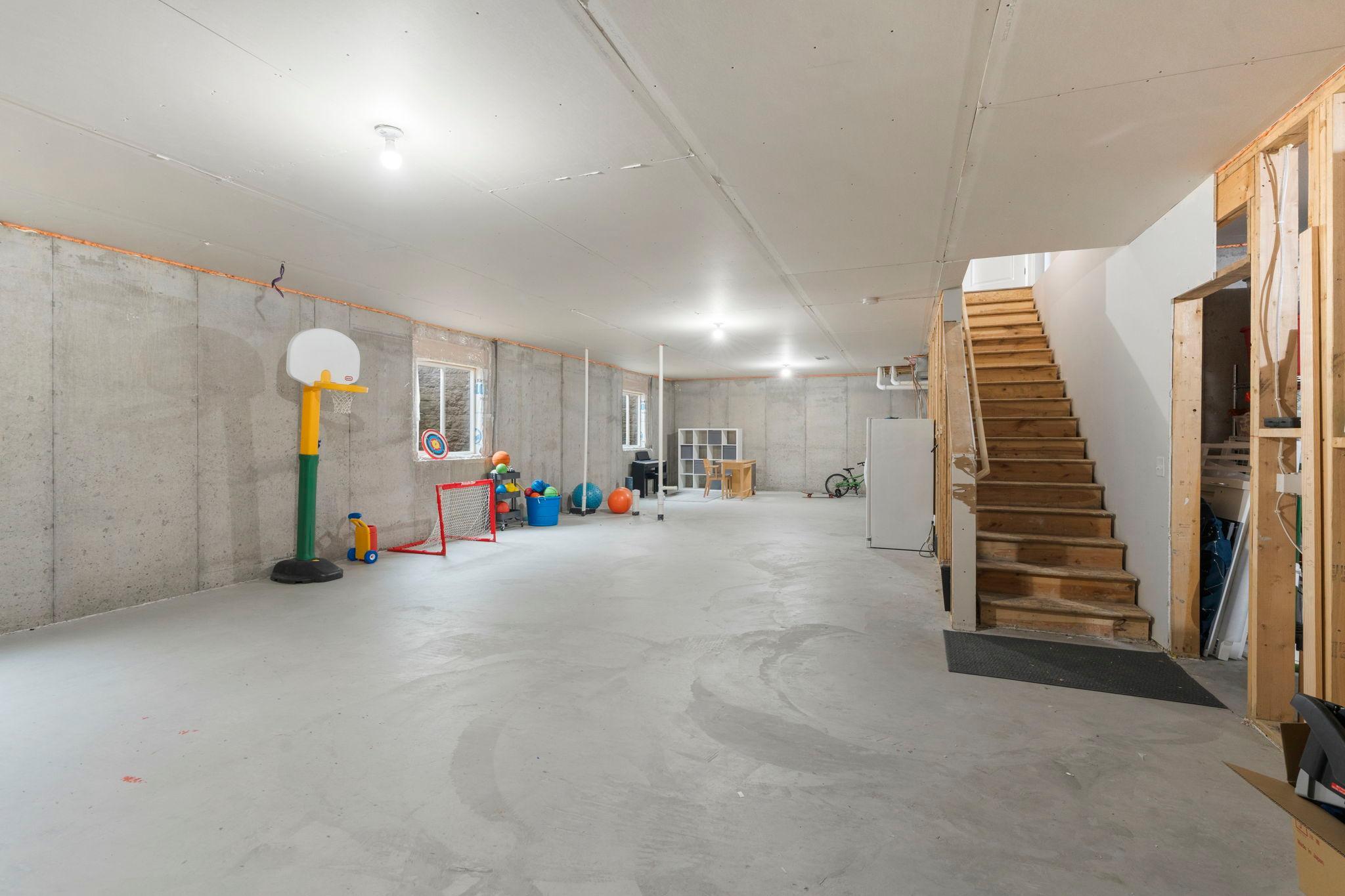 Expansive floors are the perfect place for an indoor playground...bike, trike, big wheel, skate, etc!