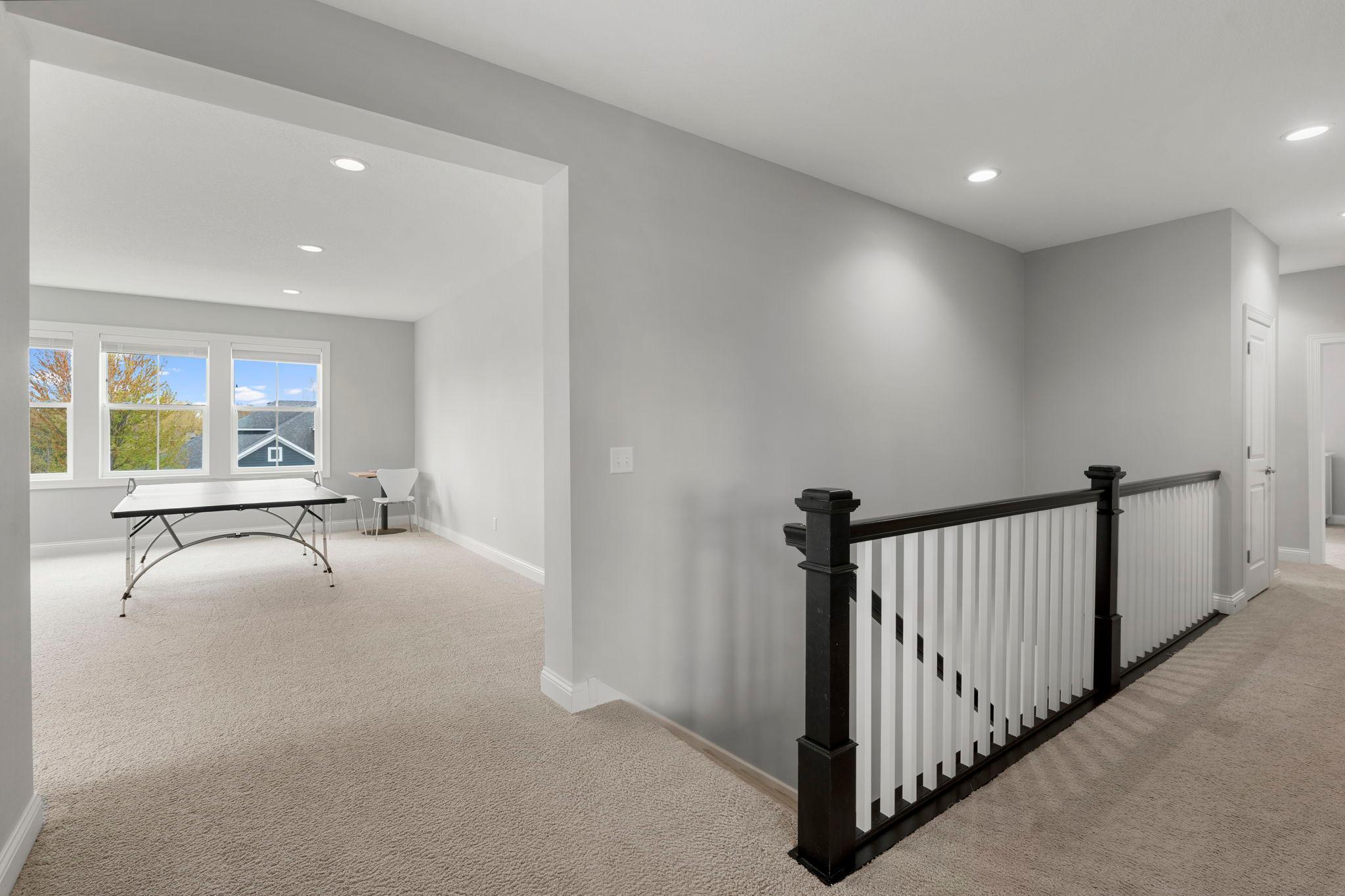 Upstairs is home to four bedrooms and an amazing bonus space!