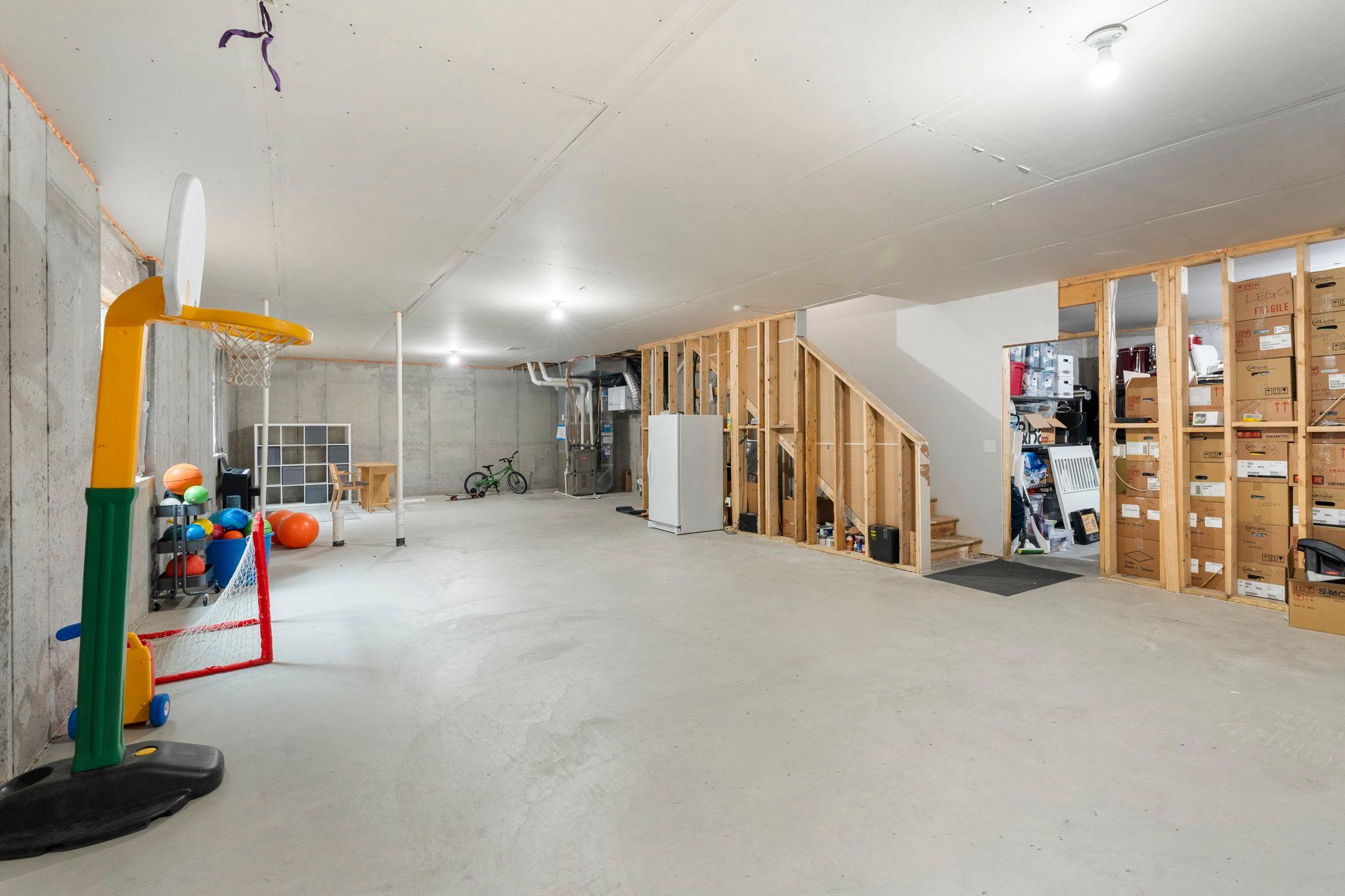 Roughed in bathroom and huge storage space, too.