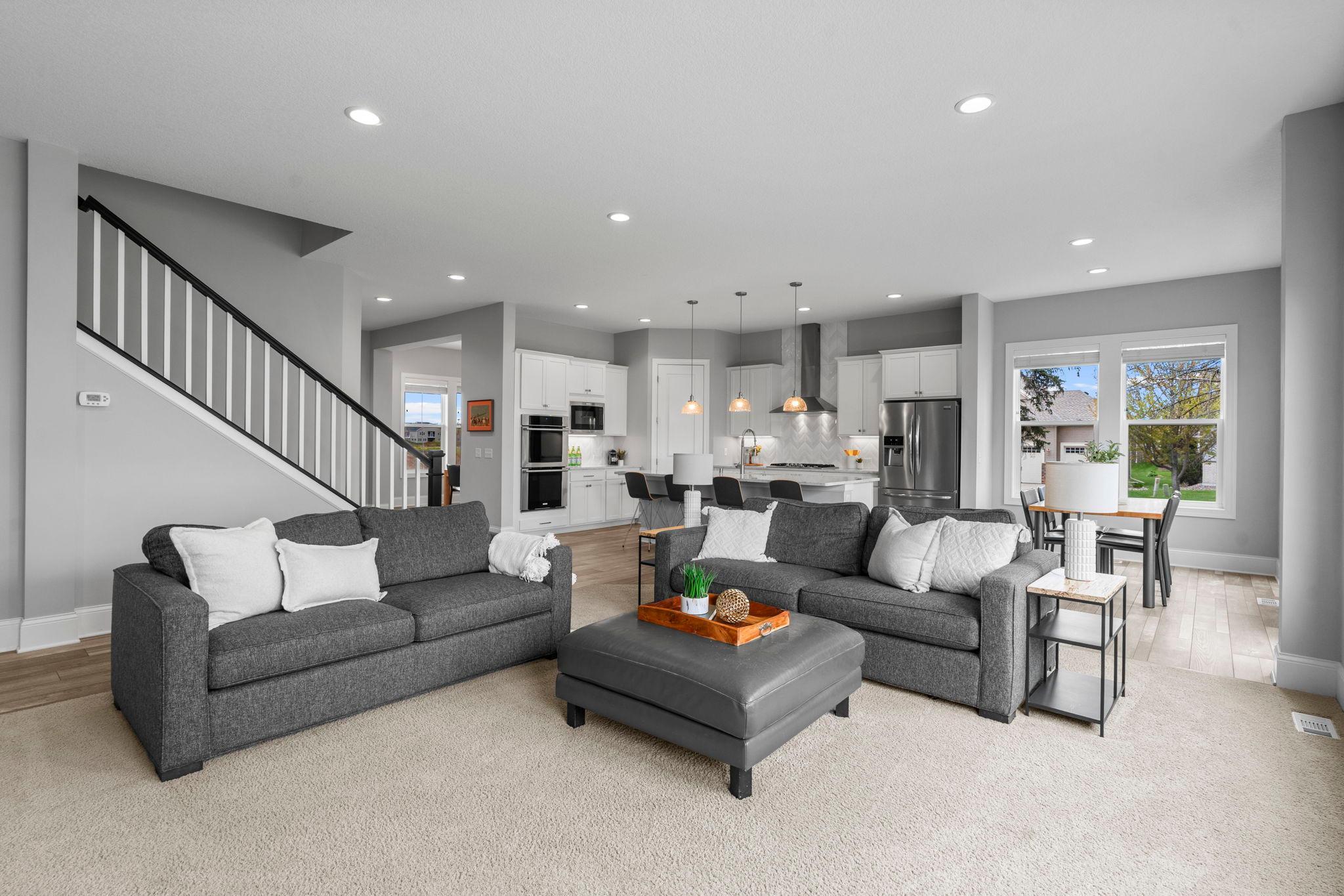 The kitchen, informal dining and great rooms are open concept.