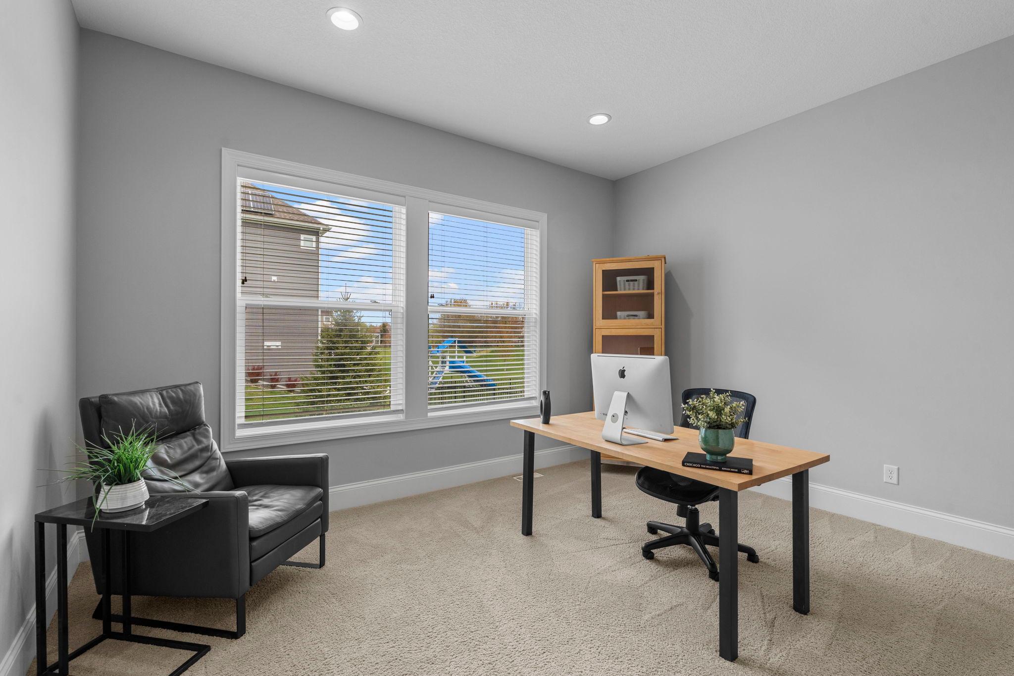 The home office is nestled in a back corner of the house. Another room that offers plenty of flexibility for whatever you may need to use it for.