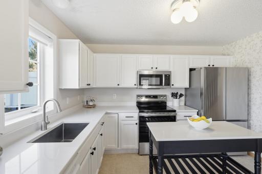 Beautiful quartz countertops & and stainless appliances