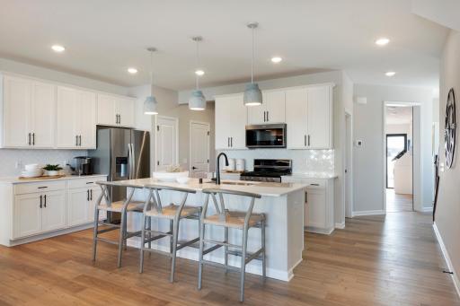 Welcome to the Ashton! This thoughtfully designed home is the perfect balance between elegance and function! Photo of model home.