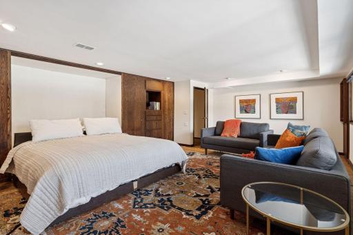 y room has a custom design king size murphy bed.
