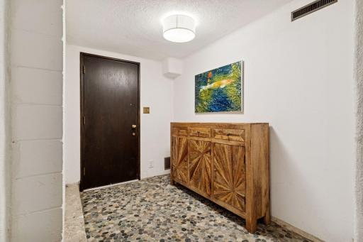 New custom stone flooring in the mudroom.