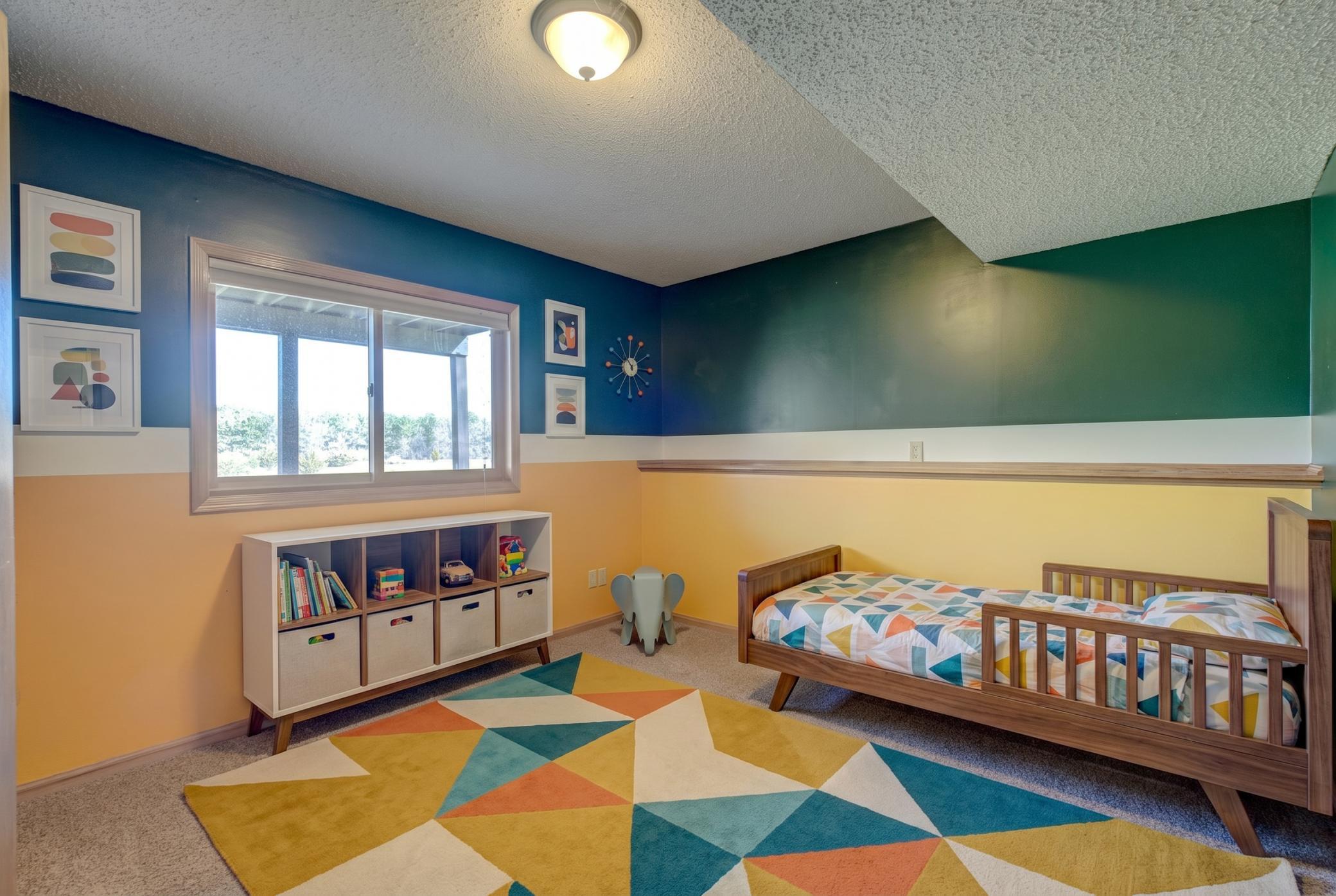 Lower level bedroom (virtually staged)