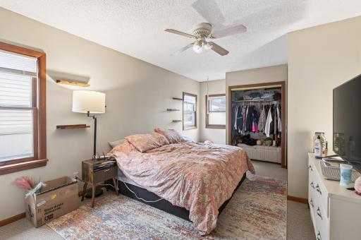 Main floor primary bedroom with 2 separate closets.