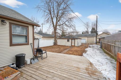 Wood deck off of the backside of the home.