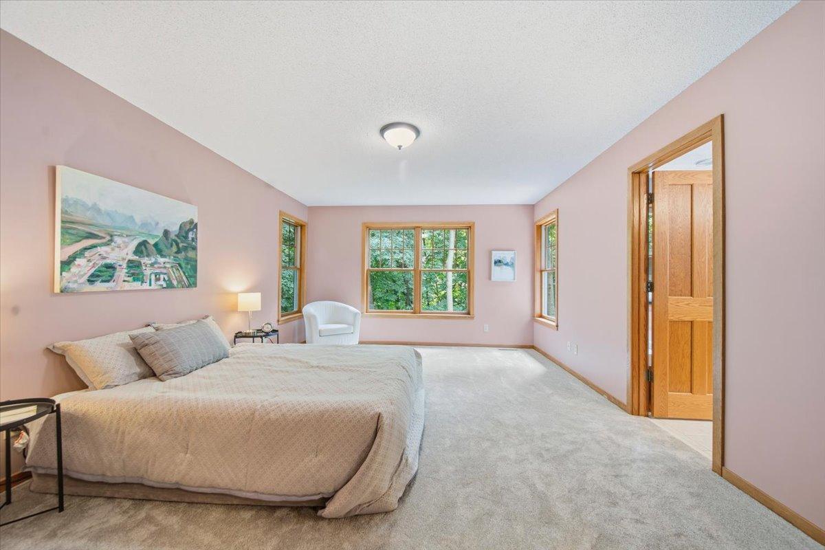 Upper Level Primary Bedroom with Walk-in Closet and Full Bathroom