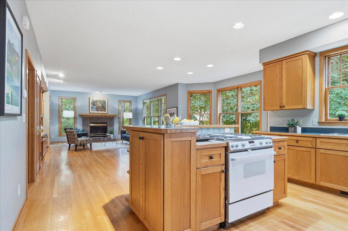 Kitchen flows into Informal Dining space and Cozy Living Room, Great for Gathering with Family and Friends!