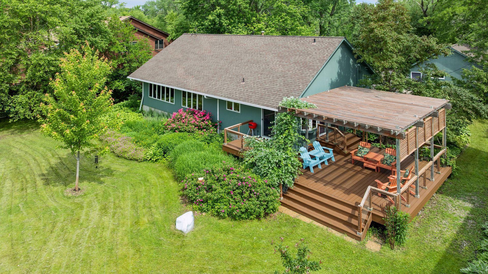 This charming one level rambler provides a year-round vacation feel!