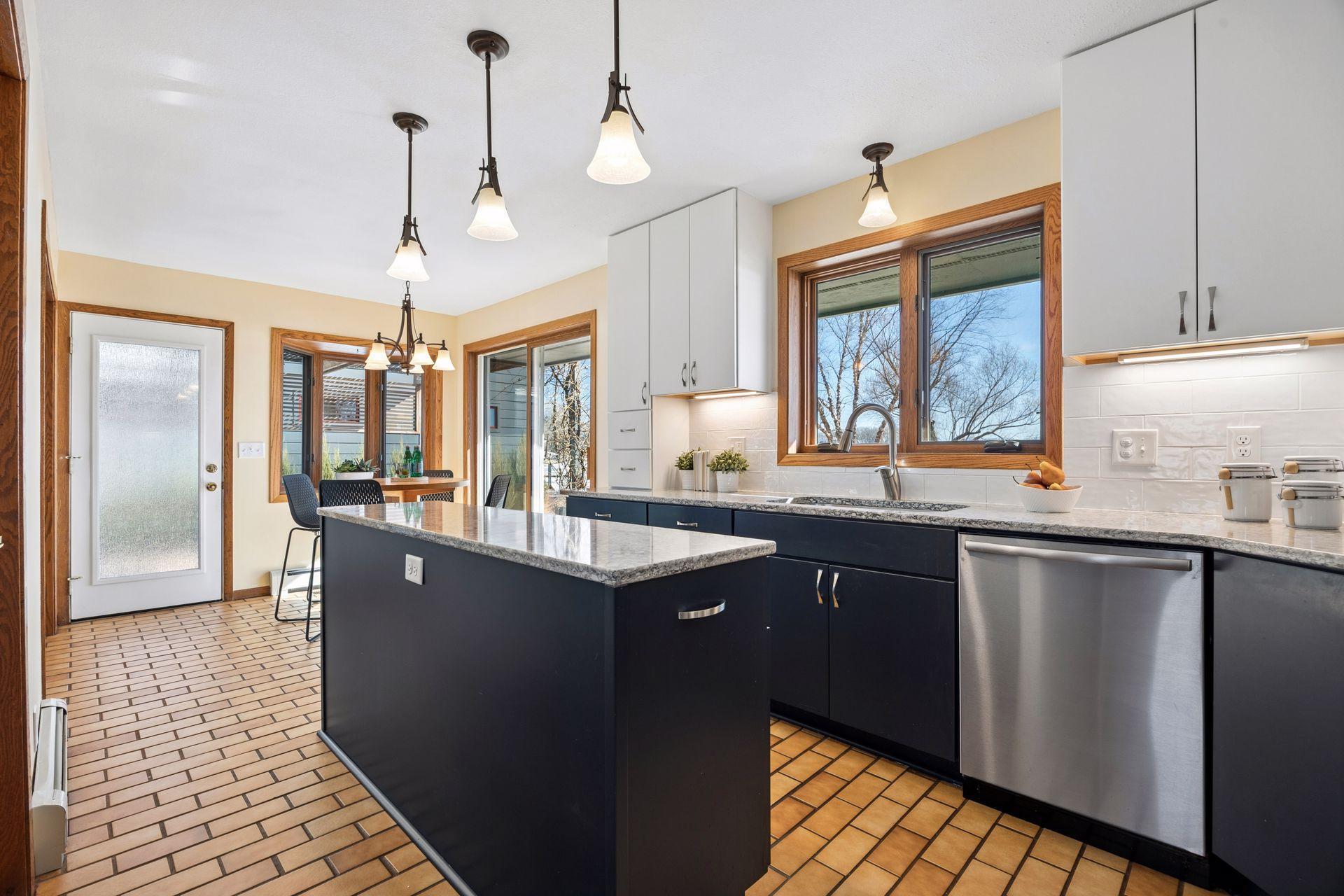 Center island with beverage fridge—perfect for entertaining.