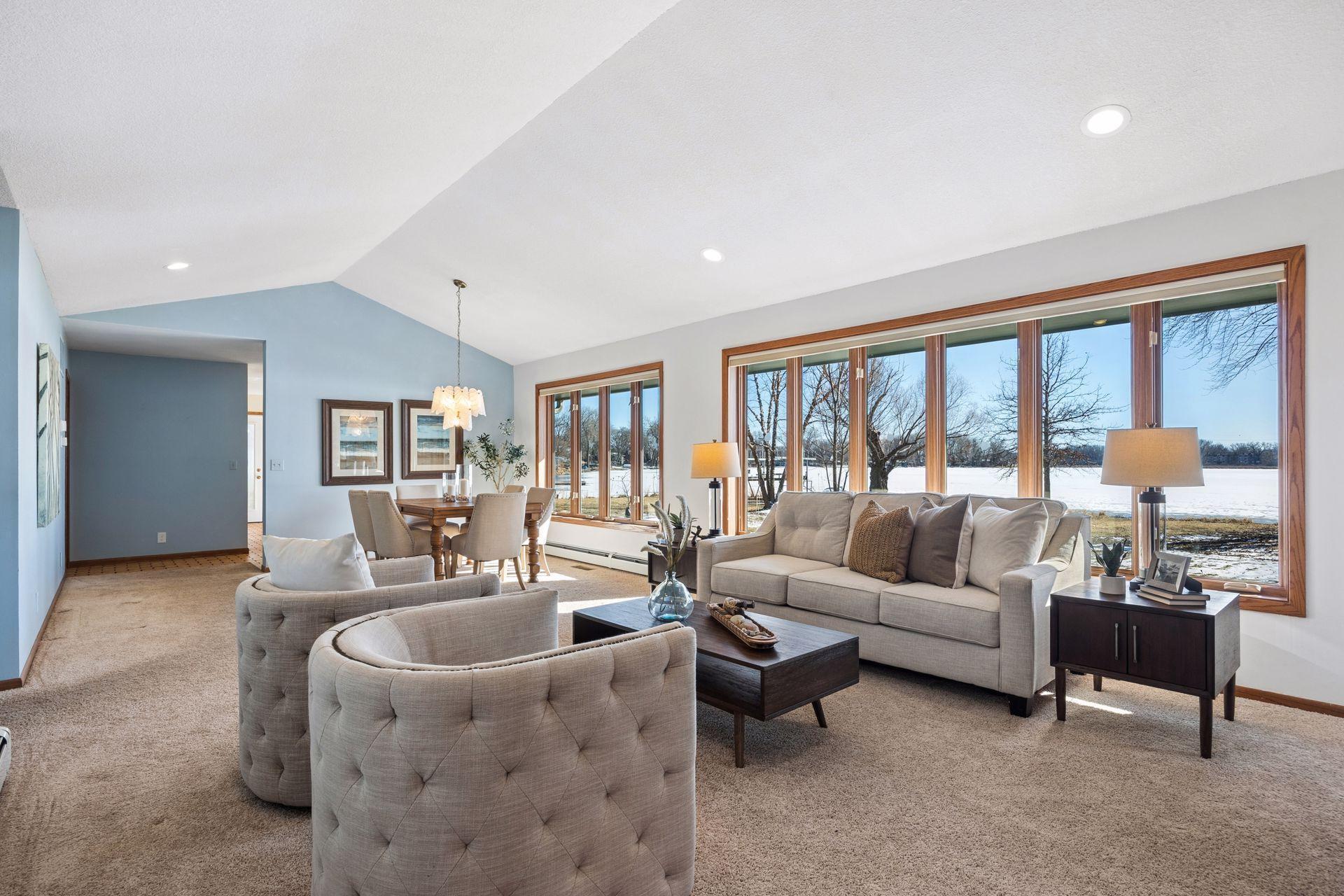 A wall of lakeside glass captures stunning water views.