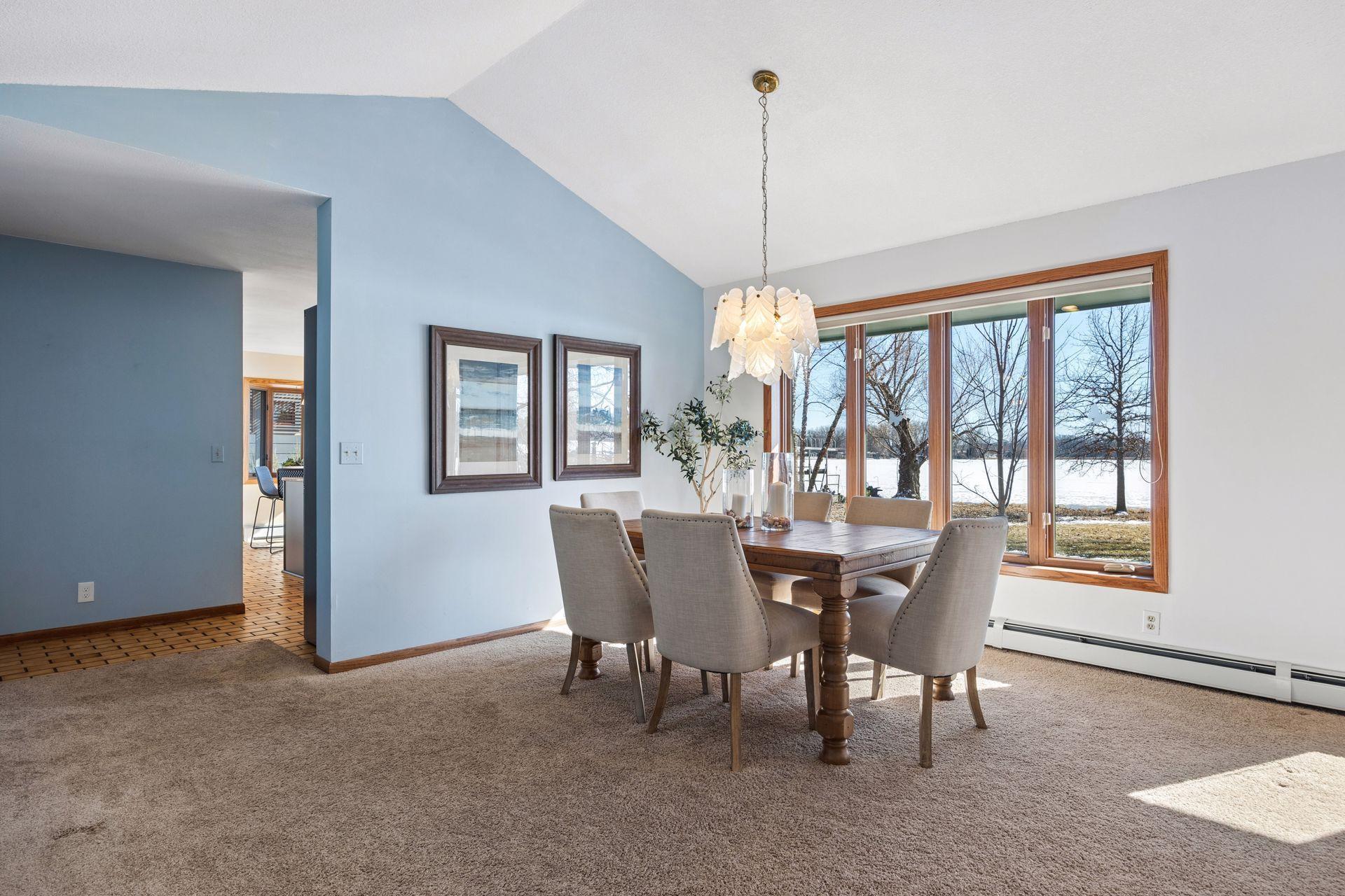 Vaulted ceilings enhance the spacious feel of the family and dining rooms.