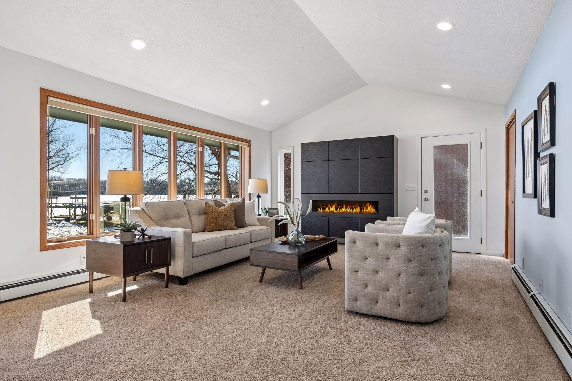 Light-filled family room with recessed ceiling lighting.