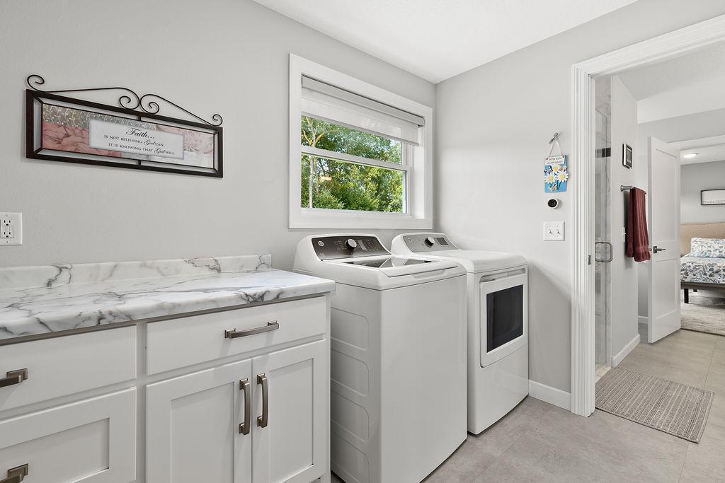 Laundry room off of owner suite bathroom