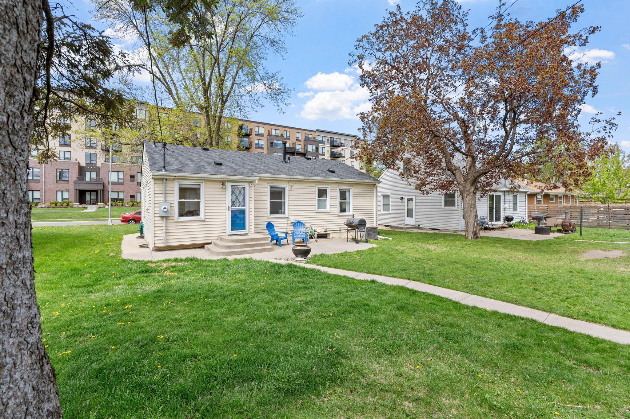 Concrete patio and flat back yard.