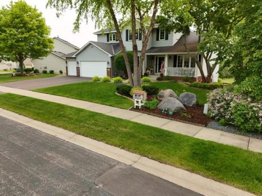 This home has classic charm with a front porch, landscaped yard, and a NEW ROOF and DRIVEWAY!