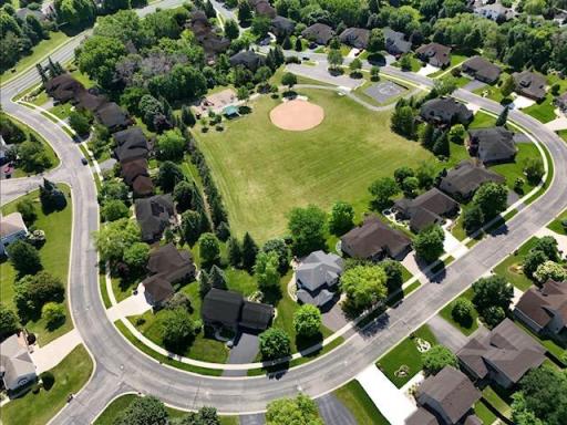 You'll enjoy wide open views of this quiet neighborhood park from this home, as well as no homes behind you! (The home is highlighted for locational purposes.)