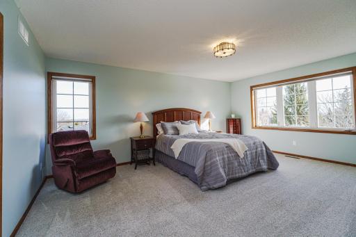 The sizeable ownerâs suite overlooks the back of the home and is large enough to accommodate a king-sized bed and substantial furnishings.