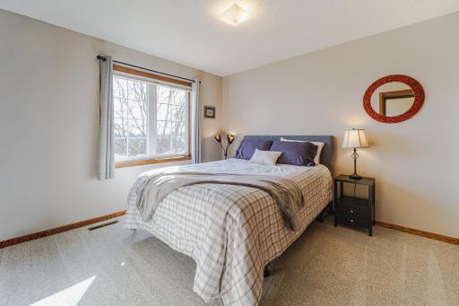 This is one of four upper level bedrooms. This room was freshly painted and overlooks the back of the home.