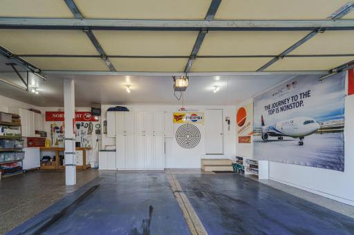 Even the HEATED and INSULATED garage has great features, including attic storage, a Rustoleum floor and a service door to the exterior.