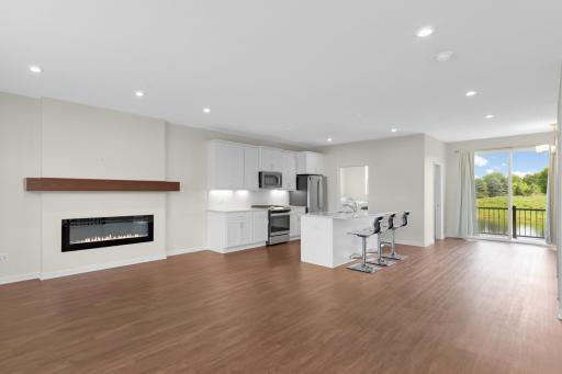 The Kitchen, Dining Area and Living Room flow together for easy entertaining.